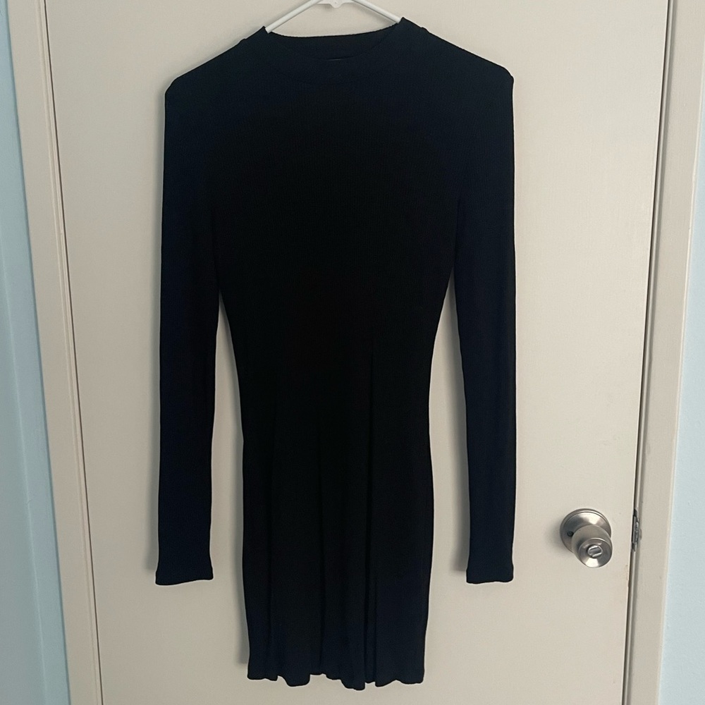 RCVA ribbed black long sleeved ribbed high neck mini dress w/ open v back detail